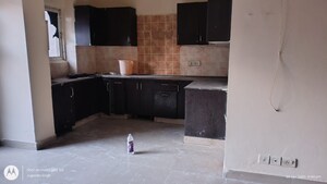 Kitchen in 3.5 BHK Apartment at Aims Golf City, Sector 75 – for Sale