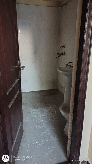 Bathroom in 3.5 BHK Apartment at Aims Golf City, Sector 75 – for Sale