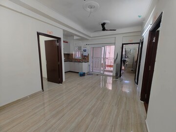 Living Room in 2 BHK Apartment at Amrapali Tropical Garden, Tech Zone 4 Greater Noida – for Rent