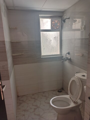 Bathroom in 3 BHK Apartment at Amrapali Leisure Park, Amrapali Leisure Valley – for Rent