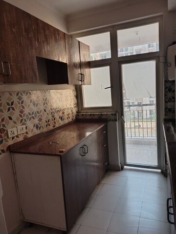 Kitchen in 2 BHK Apartment at Amrapali Leisure Park, Amrapali Leisure Valley – for Rent