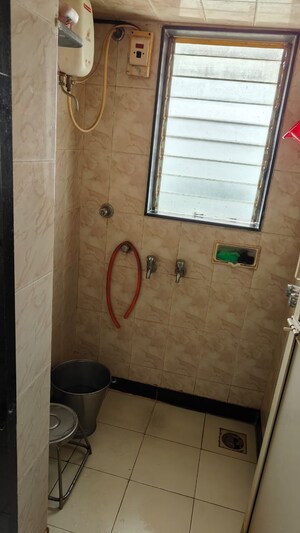 Bathroom in 1 BHK Apartment at Green View Complex, Borivali East – for Sale