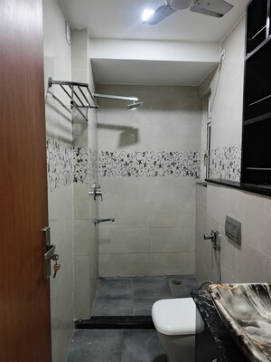 Bathroom in 3 BHK Apartment at Moti Nagar – for Rent