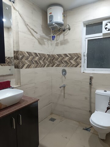 Bathroom in 3 BHK Apartment at Moti Nagar – for Rent
