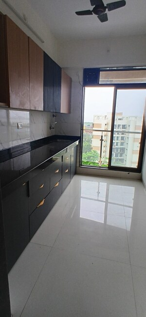 Kitchen in 2 BHK Apartment at Sea Regency, Ulwe Sector 3 – for Rent