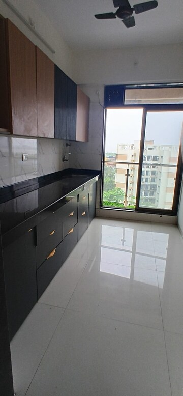 Kitchen in 2 BHK Apartment at Sea Regency, Ulwe Sector 3 – for Rent