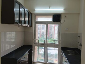 Kitchen in 1 BHK Apartment at Raunak Bliss, Ghodbunder Road – for Rent