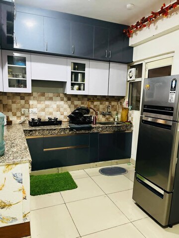 Kitchen in 2 BHK Apartment at AFOWO Raksha Addela, Sector 16c Greater Noida – for Rent