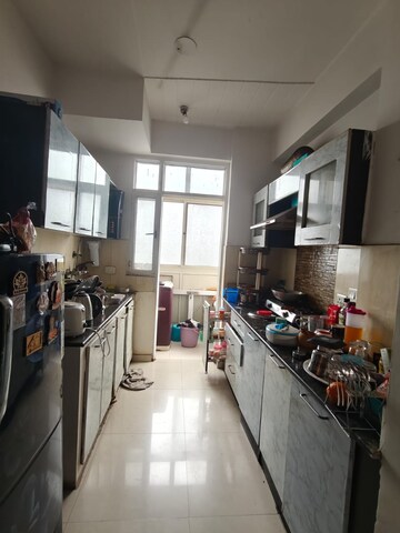 Kitchen in 2.5 BHK Apartment at Prateek Wisteria, Sector 77 – for Rent