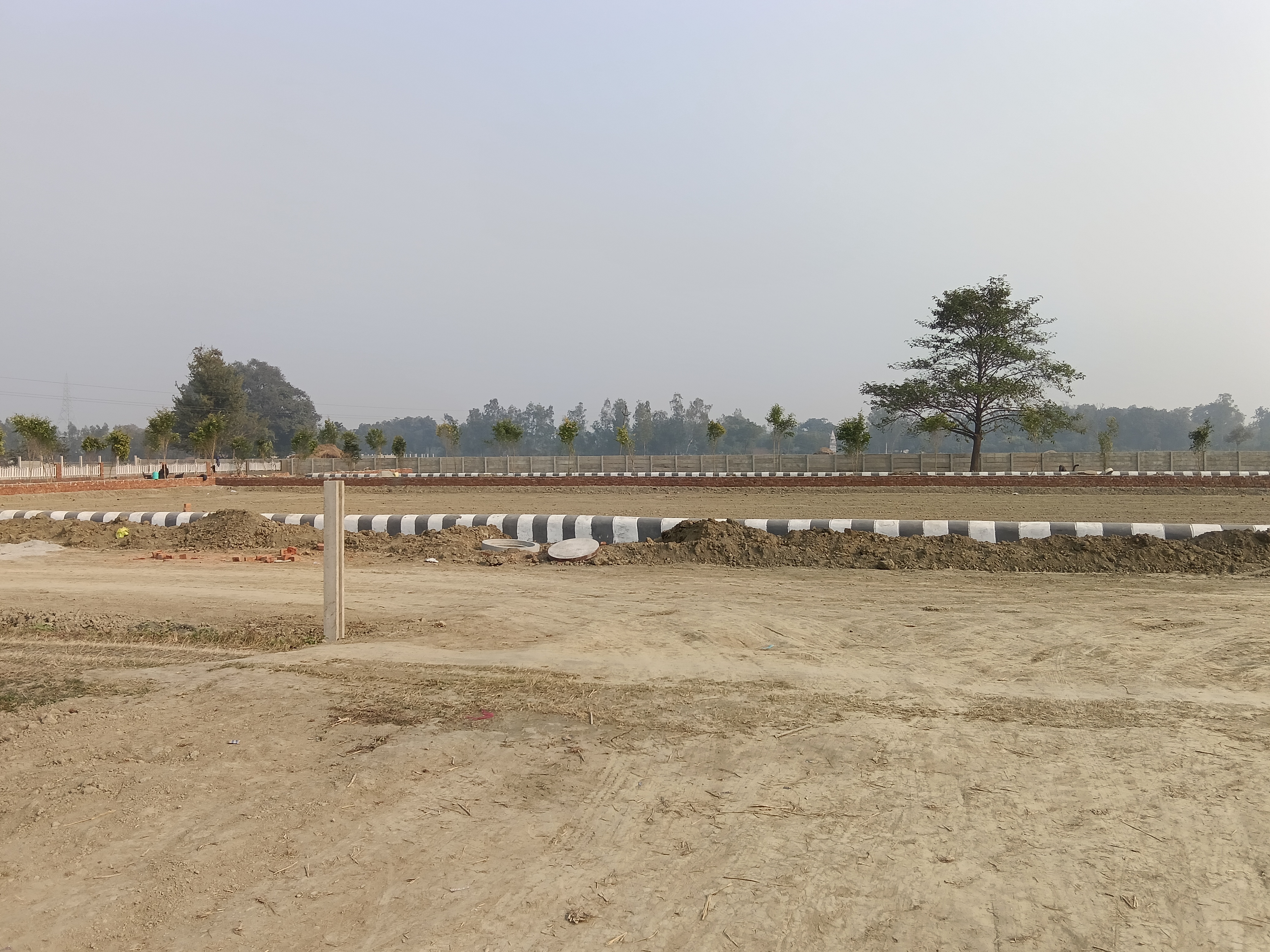 Plot For Sale in Iscon Green City Gosaigan