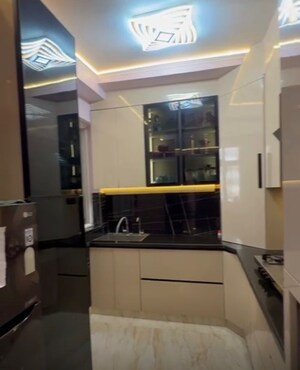 Kitchen in 3 BHK Apartment at Amrapali Golf Homes, Sector 4 Greater Noida – for Sale