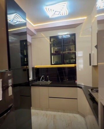 Kitchen in 3 BHK Apartment at Amrapali Golf Homes, Sector 4 Greater Noida – for Sale