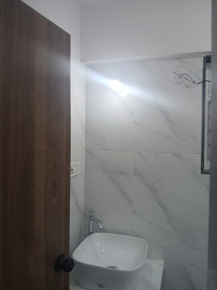 Bathroom, raj-infinia 2 Bedroom 750 Sq.Ft. Apartment In Malad West Mumbai 9689584
