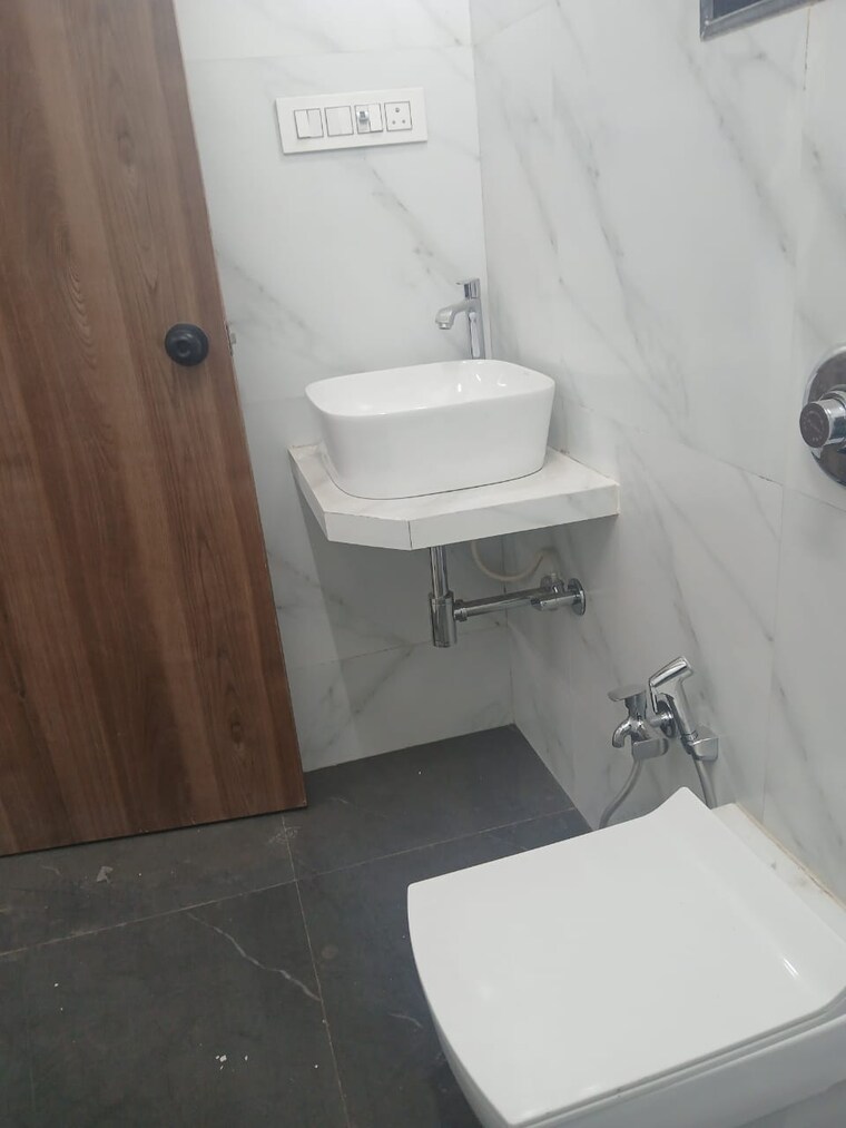 Bathroom, raj-infinia 2 Bedroom 750 Sq.Ft. Apartment In Malad West Mumbai 9689584
