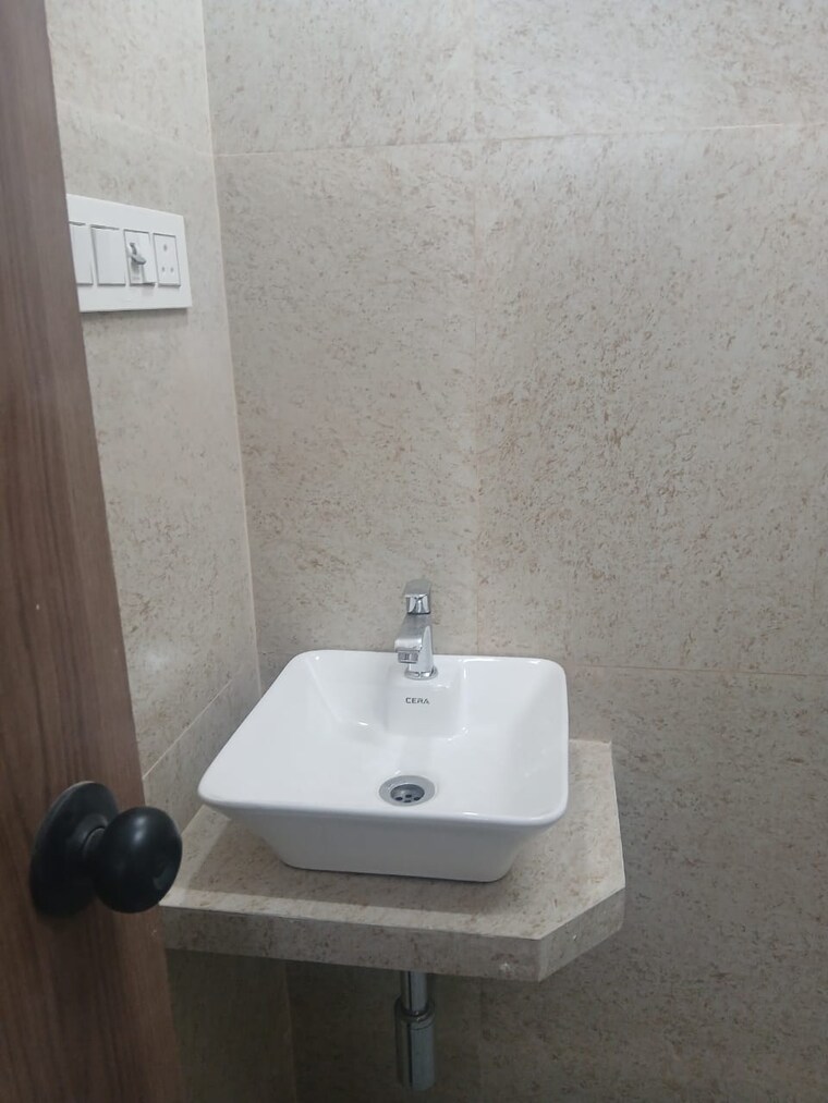 Bathroom, raj-infinia 2 Bedroom 750 Sq.Ft. Apartment In Malad West Mumbai 9689584