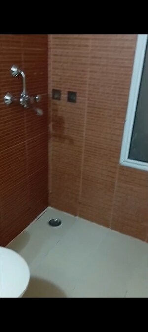 Bathroom in 2.5 BHK Apartment at Gaur City 5th Avenue, Sector 4 Greater Noida – for Rent