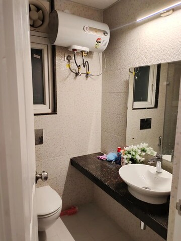 Bathroom in 2 BHK Apartment at Chandra Panorama, Sushant Golf City – for Rent