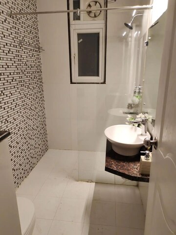 Bathroom in 2 BHK Apartment at Chandra Panorama, Sushant Golf City – for Rent