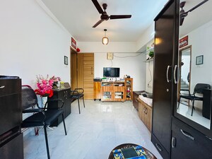 Living Room in 1 BHK Apartment at Rakshalekha Society, Dattawadi – for Sale