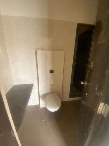 Bathroom in 2 BHK Apartment at Shree Tirupati STG Signature Residency, Patlipada – for Rent