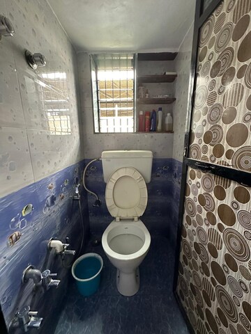 Bathroom in 1 BHK Apartment at Trisangam CHS, Dombivli West – for Rent