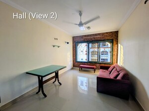 Living Room in 2 BHK Apartment at Shree Vivekanand Nagar CHS, Borivali West – for Sale