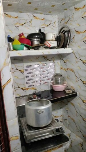 Kitchen in 2 BHK Apartment at Husainganj – for Rent