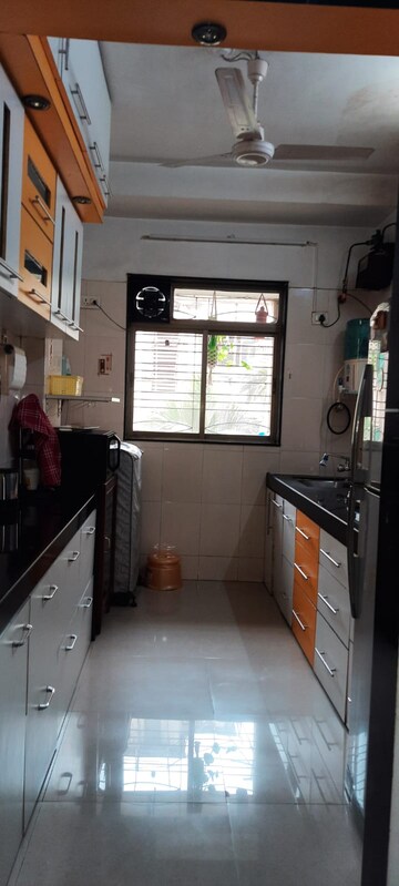 Kitchen in 2 BHK Apartment at Usha Gardens, Malad West – for Sale
