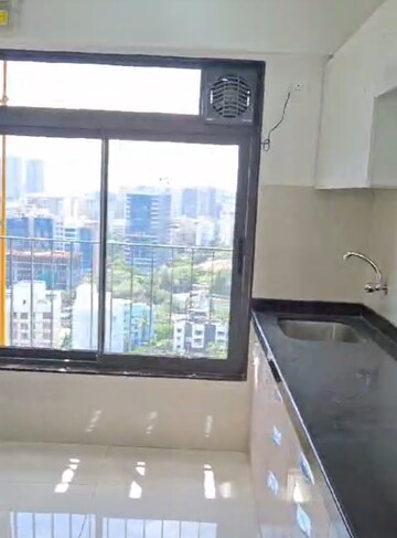 Kitchen in 1 BHK Apartment at Omkar Signet, Malad East – for Rent