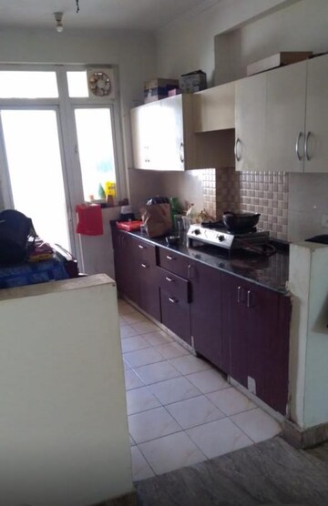 Kitchen in 2 BHK Apartment at Amrapali Silicon City, Sector 76 – for Rent