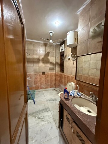 Bathroom in 1 BHK Builder Floor at Kalkaji – for Rent