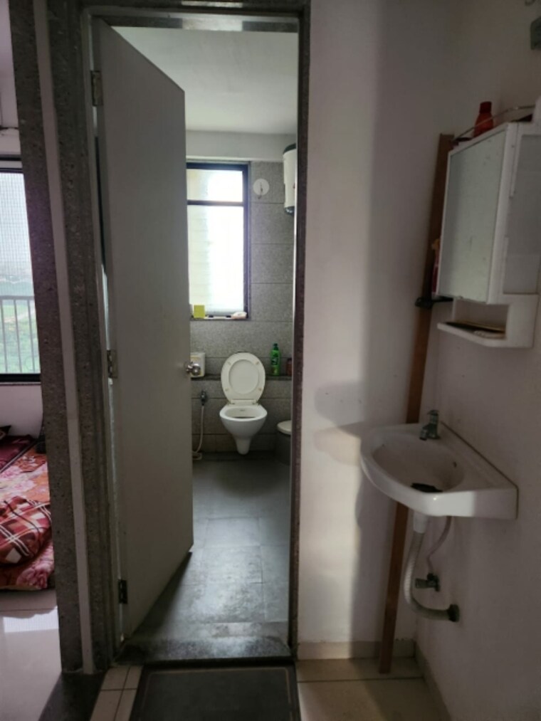 Bathroom, sun-rising-homes 1.5 Bedroom 1000 Sq.Ft. Apartment In Jagatpur Ahmedabad 9690318