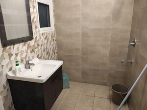 Bathroom in 4 BHK Apartment at Amrapali Crystal Homes, Sector 76 – for Rent