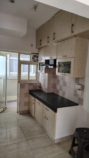 Kitchen in 4 BHK Apartment at Amrapali Crystal Homes, Sector 76 – for Rent