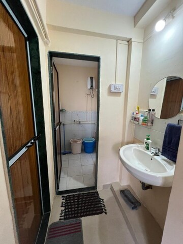 Bathroom in 1 BHK Apartment at New Mhada Tower, Malad West – for Rent