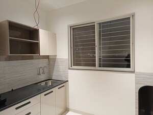 Kitchen in 2 BHK Apartment at Woodsville Phase III, Moshi – for Rent