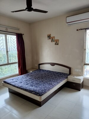 Bedroom in 2 BHK Apartment at Naiknavare Sylvan Heights, Aundh – for Rent