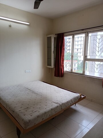 Bedroom in 2 BHK Apartment at Naiknavare Sylvan Heights, Aundh – for Rent