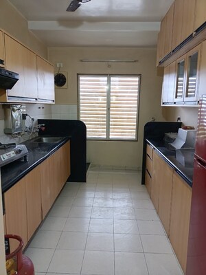 Kitchen in 2 BHK Apartment at Naiknavare Sylvan Heights, Aundh – for Rent