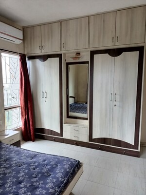 Bedroom in 2 BHK Apartment at Naiknavare Sylvan Heights, Aundh – for Rent