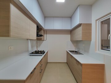 Kitchen in 3.5 BHK Apartment at Bhartiya Nikoo Homes Phase 2, Thanisandra Main Road – for Rent