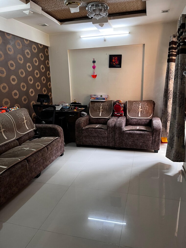 Living Room, gk-royale-rahadki-greens-phase-2 1 Bedroom 623 Sq.Ft. Apartment In Rahatani Pune 9690560