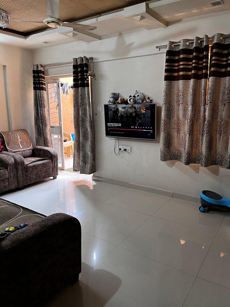 Living Room, g-k-royal-rahadki-greens-phase-2 1 Bedroom 623 Sq.Ft. Apartment In Rahatani Pune 9690560