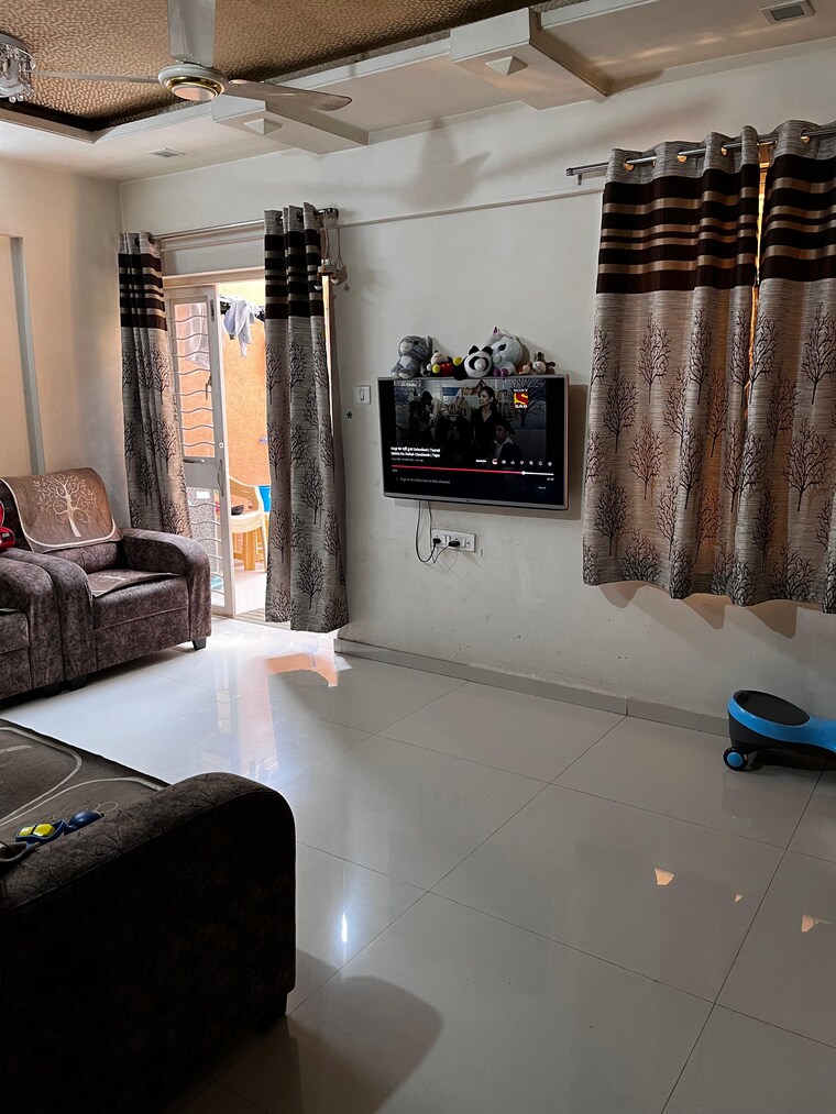 Living Room, gk-royale-rahadki-greens-phase-2 1 Bedroom 623 Sq.Ft. Apartment In Rahatani Pune 9690560