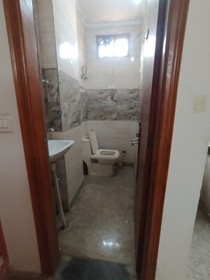 Bathroom in 1.5 BHK Builder Floor at Govindpuri – for Rent