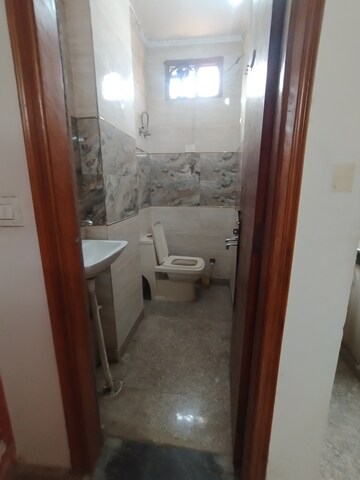Bathroom in 1.5 BHK Builder Floor at Govindpuri – for Rent