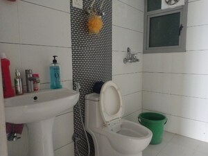 Bathroom in 2 BHK Apartment at Gulshan Bellina, Sector 16 Greater Noida – for Rent