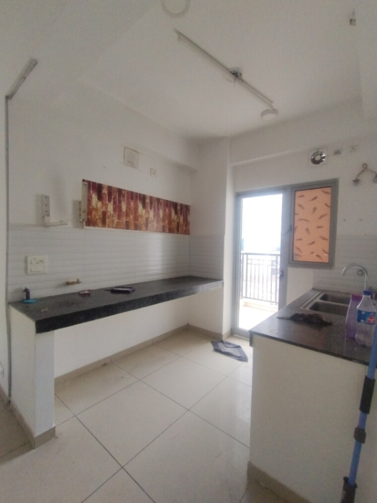 Kitchen, gulshan-bellina 2 Bedroom 597 Sq.Ft. Apartment In Sector 16 Greater Noida Greater Noida 9690732