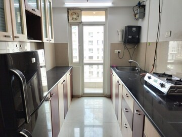 Kitchen in 2 BHK Apartment at Hiranandani Estate Corsica, Ghodbunder Road – for Rent