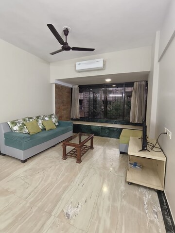 Living Room in 2 BHK Apartment at Haridwar CHS Malad, Malad West – for Rent